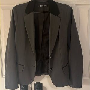 Short, slim fit blazer by 7th Avenue New York & Company. Size 12. Gently used.